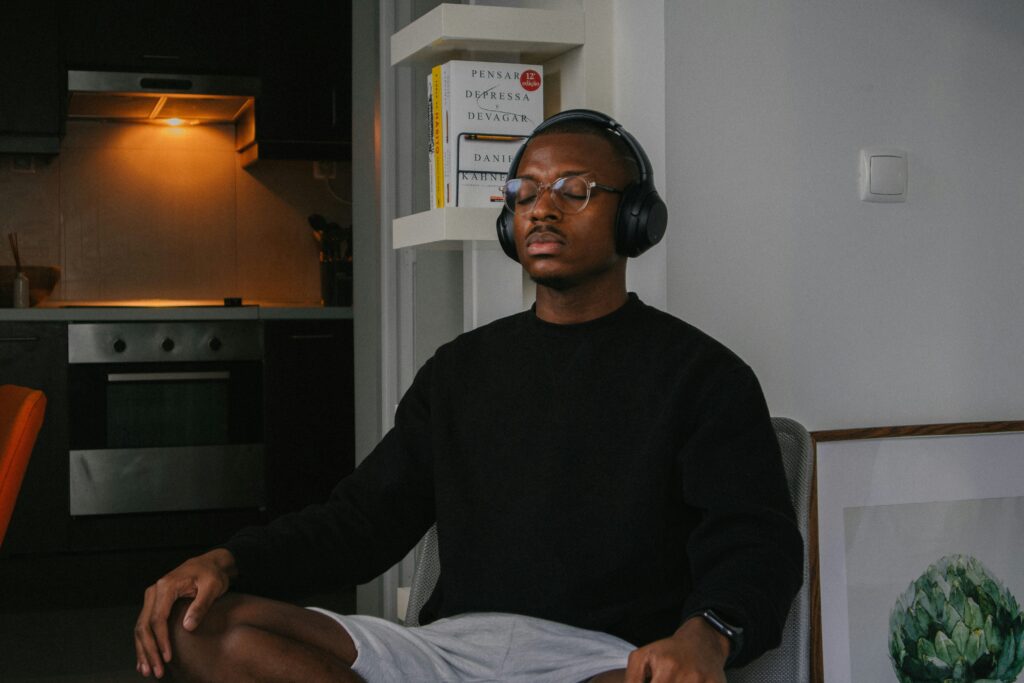 Man sitting while practicing pendulation during meditation.